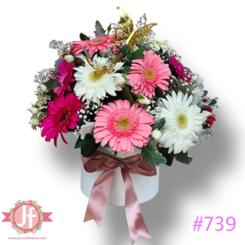 739-caja-redonda-con-20-gerberas-y-mariposa, Diferencia entre florería y floristería