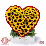 Corazón floral con girasoles y rosas rojas frescas para envío de flores a domicilio en Guadalajara, Zapopan, Tlaquepaque y Tonalá.