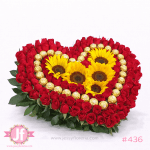 Caja corazón con rosas rojas, girasoles y chocolates Ferrero para envío de flores a domicilio en Guadalajara, Zapopan y zona metropolitana.