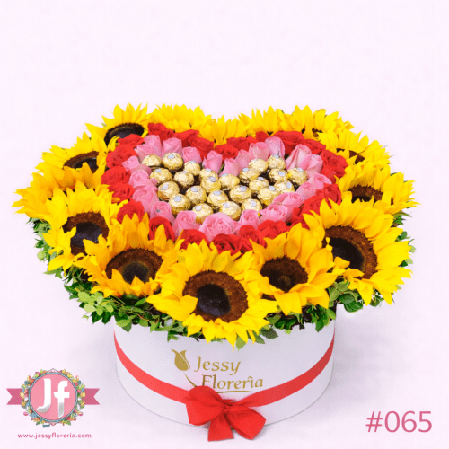 Caja con girasoles, rosas frescas y chocolates Ferrero para envío de flores y regalos a domicilio en Guadalajara, Zapopan y zona metropolitana.