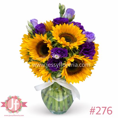 Florero con 10 girasoles frescos y lisianthus morado, un detalle floral elegante y alegre ideal para enviar a domicilio en Guadalajara y zona metropolitana.