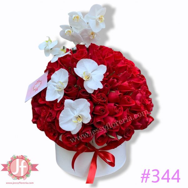Caja circular de 100 rosas rojas y 2 varas de orquídeas