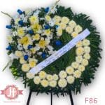 f86 Corona rosa azul en tripié