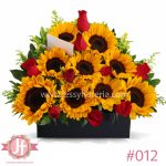 Caja con 9 girasoles y 9 rosas rojas frescas para envío de flores a domicilio en Guadalajara, Zapopan y zona metropolitana.