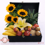 Cofre frutal con girasoles y fruta de temporada para envío de flores y regalos a domicilio en Guadalajara, Zapopan y zona metropolitana.