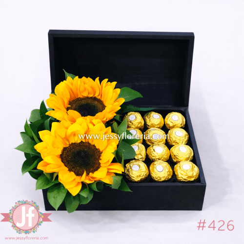 Cofre con girasoles frescos y chocolates Ferrero para envío de flores y regalos a domicilio en Guadalajara, Zapopan y zona metropolitana.