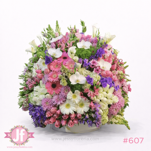 Caja circular vintage grande con rosas, gerberas, orquídeas y flores surtidas para envío de flores a domicilio en Guadalajara y zona metropolitana.