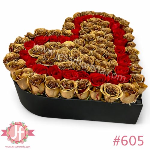 Caja negra en forma de corazón con rosas doradas y rojas frescas, un detalle elegante y romántico ideal para enviar a domicilio en Guadalajara y zona metropolitana.