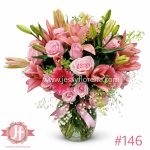 Florero con lilis rosas y gerberas frescas para envío de flores a domicilio en Guadalajara, Zapopan, Tlaquepaque y Tonalá.