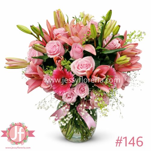 Florero con lilis rosas y gerberas frescas para envío de flores a domicilio en Guadalajara, Zapopan, Tlaquepaque y Tonalá.