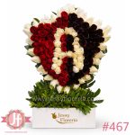 escudo del atlas con rosas rojas arreglo floral en Guadalajara