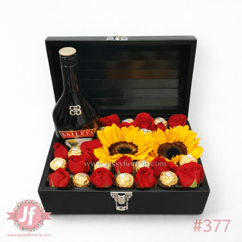 Cofre Baileys con girasoles, rosas rojas y Ferreros
